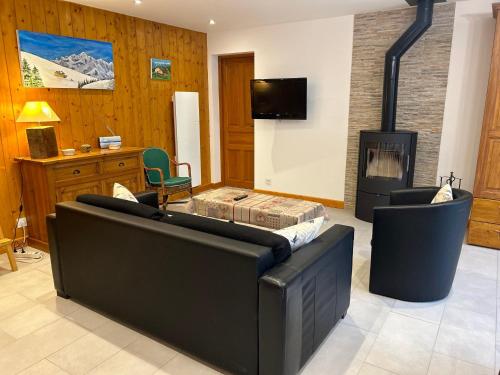 Appartement Spacieux - Terrasse, Jardin et Cheminée - À 5 Min du Centre des Gets