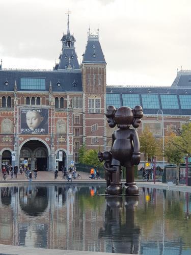 a statue of a bear in front of a building at EUPHRATE HOUSeBOAT in Amsterdam