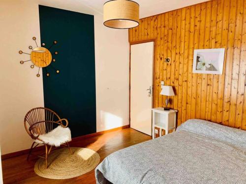 Ένα ή περισσότερα κρεβάτια σε δωμάτιο στο La Maison de Marie « Le Rocher »