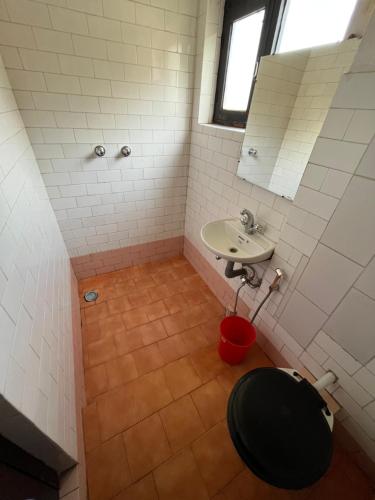 a bathroom with a sink and a toilet at Bhaktapur Guest House in Bhaktapur