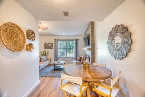 a dining room with a wooden table and chairs at Travel for work - Stylish 3 BDR - Southern Georgia in Moultrie