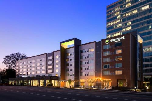 a rendering of a hotel building at night at Element Atlanta Buckhead in Atlanta