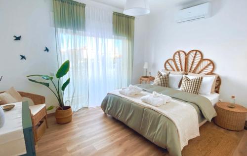 Postel nebo postele na pokoji v ubytování Cegonha Branca Beach Flat