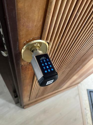 a remote control sticking out of a door at LOFT29 Design home near the Vatican in Rome