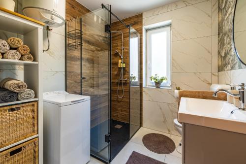 Ένα μπάνιο στο Apartman Sara
