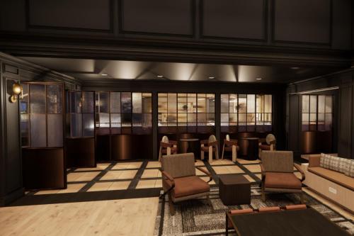 a rendering of a lobby with chairs and tables at The Publisher, Fredericksburg, a Tribute Portfolio Hotel in Fredericksburg
