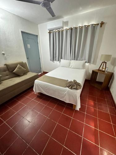 Cama o camas de una habitación en Creta Hotel & Suites