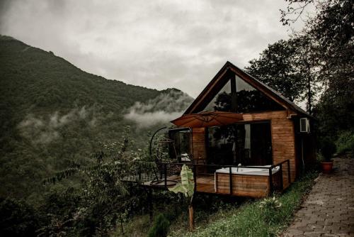 a small cabin in the middle of a mountain at Woodpecker Georgia in Batumi