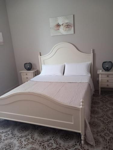 Letto o letti in una camera di Stella Marina Bed and Breakfast sul mare