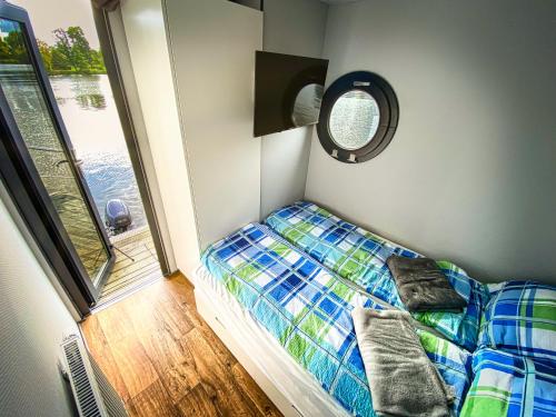 Ένα ή περισσότερα κρεβάτια σε δωμάτιο στο COSY Hannah - Festlieger