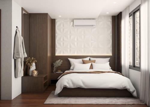 a bedroom with a large bed and a window at Hanoi Diamond King Hotel & Travel in Hanoi