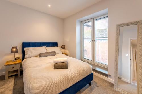 Voodi või voodid majutusasutuse Pass the Keys 5B One bedrom Central Modern Apartment toas