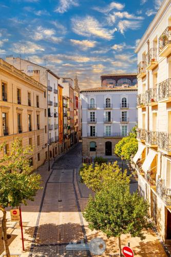 an empty street in a city with buildings at EDIFICIO 1521 in Logroño