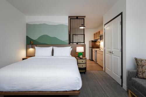 Ένα ή περισσότερα κρεβάτια σε δωμάτιο στο TownePlace Suites by Marriott Denver North Thornton