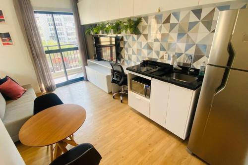 Η κουζίνα ή μικρή κουζίνα στο Apartamento encantador no Bairro da Liberdade