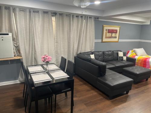 a living room with a couch and a table at Granville appartment in Chicago