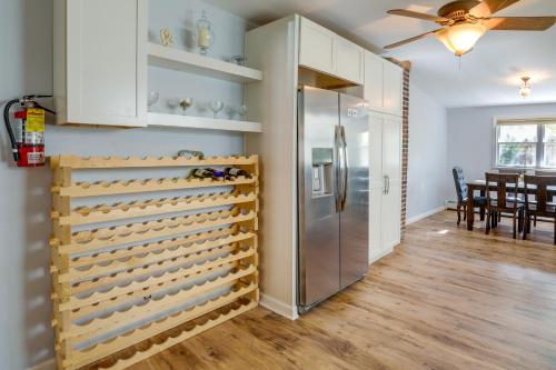 a kitchen with a refrigerator and a dining room at Centrally Located New Jersey Home with Private Yard in Lambertville