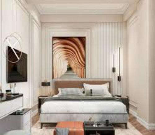 a bedroom with a bed and a painting of a tunnel at lema Hotel in Istanbul