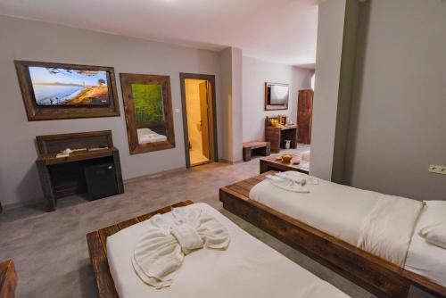 Katil atau katil-katil dalam bilik di Macartaşı Hotel