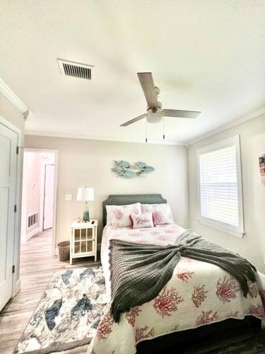 a bedroom with a bed and a ceiling fan at *The Gem* Stylish 2 Bedroom 1 Bathroom Newly Renovated in Ladson