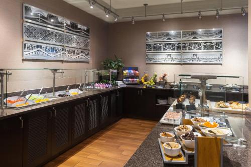 a buffet line with many different types of food at Pittsburgh Marriott City Center in Pittsburgh