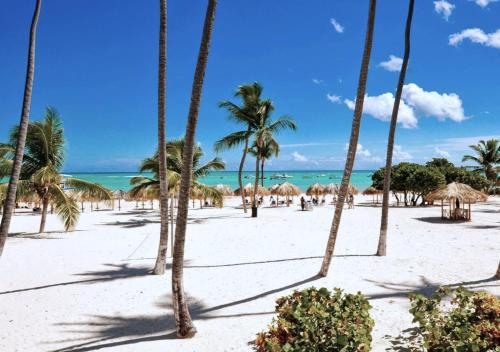 Fully renovated Beachfront 1BR Condo in the gated Stanza Mare community with a private beach, pool, onsite restaurant and modern amenities such as refrigerator, dishwasher, filtered water, microwave, BBQ, washer dryer, bamboo linens, free Wi-Fi