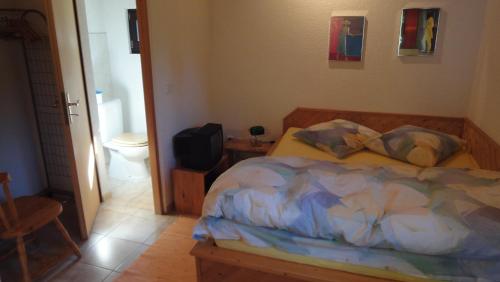 TRIXI´S GUESTHOUSEにあるベッド