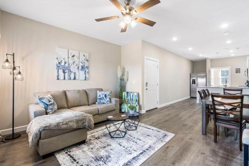 a living room with a couch and a table at Vineyards Escape 3 in Branson