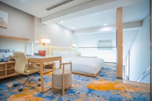 Ein Bett oder Betten in einem Zimmer der Unterkunft Hilton Lijiang