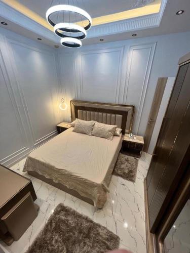 מיטה או מיטות בחדר ב-Villa, Sea Front View منتجع قرية سما العريش