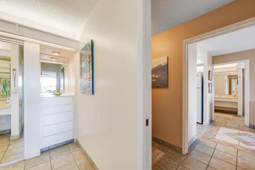 a hallway of a home with white walls at Eldorado K104 in Kahana