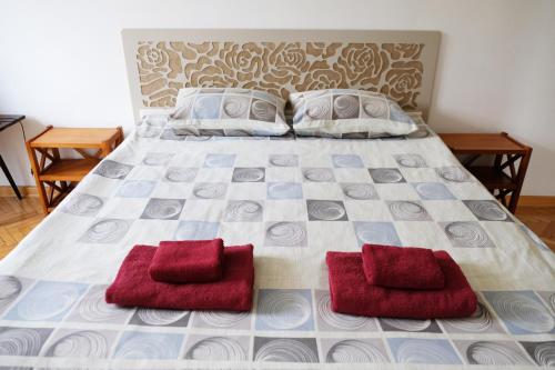 En eller flere senge i et værelse på Guest rooms