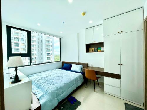 Katil atau katil-katil dalam bilik di An homestay, căn hộ Nera Garden Huế