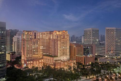 a view of a large city with tall buildings at Sheraton Shantou Hotel in Shantou