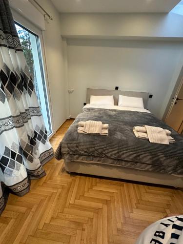 En eller flere senger på et rom på Vasilis luxury apartment (2)