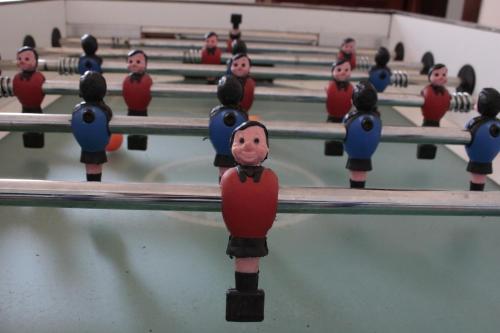 a group of toy figurines standing in a row in a gym at Penzion Hodky in Světlá pod Ještědem
