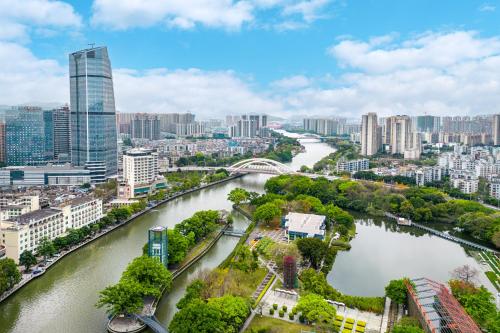 an aerial view of a river in a city at Sheraton Zhongshan Hotel in Zhongshan