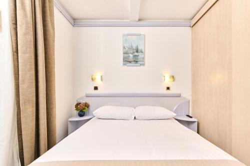 Voodi või voodid majutusasutuse Hotel Plavi Plava Laguna toas