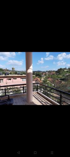 a view of a white pole from a balcony at Diya Home stay in Madikeri