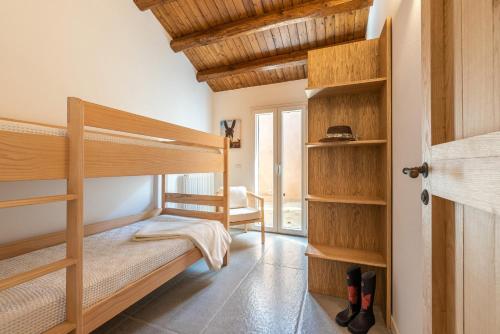 Ένα ή περισσότερα κρεβάτια σε δωμάτιο στο Borgo Le Niche by Wonderful Italy