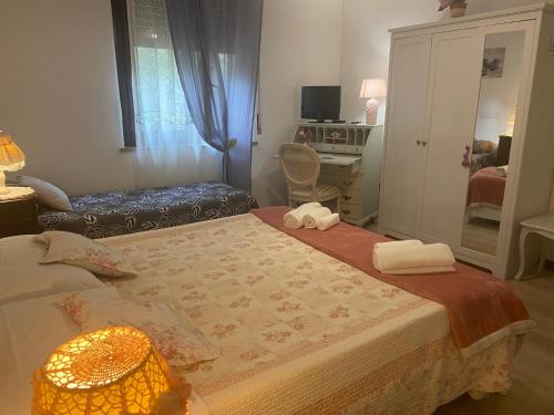 Ένα ή περισσότερα κρεβάτια σε δωμάτιο στο Dolce Vita