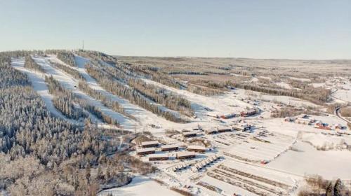 an aerial view of a ski resort in the snow at Terrassen 57 in Kungsberget - Your home away from home in Järbo