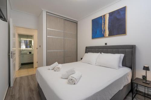 Ένα ή περισσότερα κρεβάτια σε δωμάτιο στο Elegant Oasis 2 BR Apt near the Marina & the Beach
