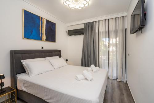 Ένα ή περισσότερα κρεβάτια σε δωμάτιο στο Elegant Oasis 2 BR Apt near the Marina & the Beach