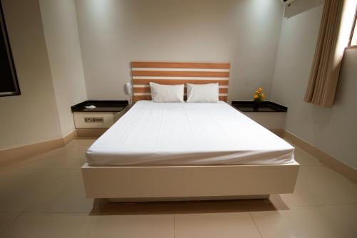 Uma cama ou camas num quarto em SP Jundiaí Hotel