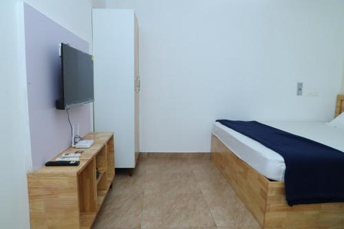 Μια τηλεόραση ή/και κέντρο ψυχαγωγίας στο Vel's Home Stay