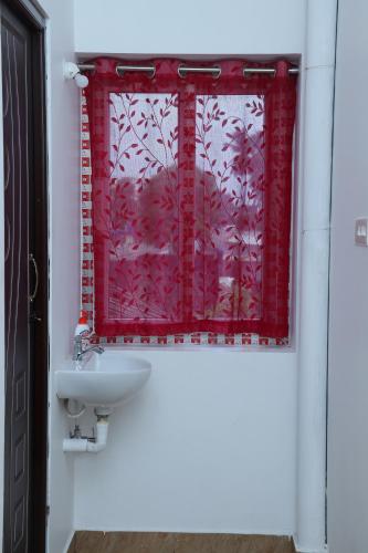 Ένα μπάνιο στο Vel's Home Stay