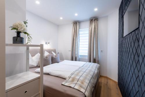 Postel nebo postele na pokoji v ubytování Appartement Auszeit