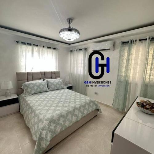 Postel nebo postele na pokoji v ubytování Apartamento Con piscina cerca de la playa