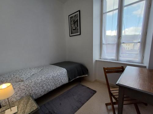 Ένα ή περισσότερα κρεβάτια σε δωμάτιο στο Le relais des randonneurs